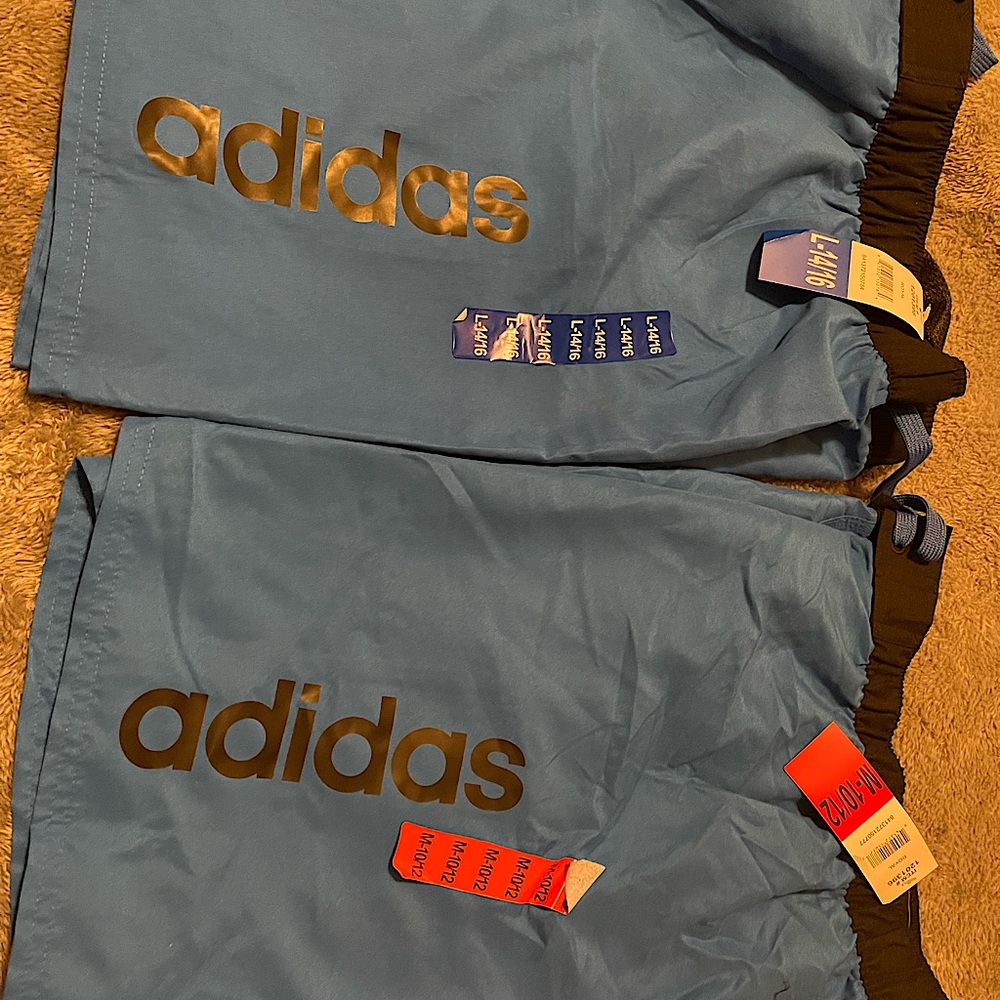 2 Adidas Boys Swim Trunk size M and L